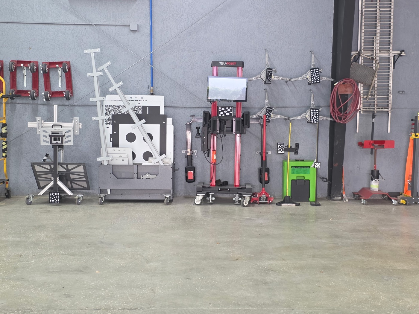 ADAS calibration station at Collision Center Orlando — a TRU-POINT system and calibration targets used to recalibrate cameras and sensors after collision repair