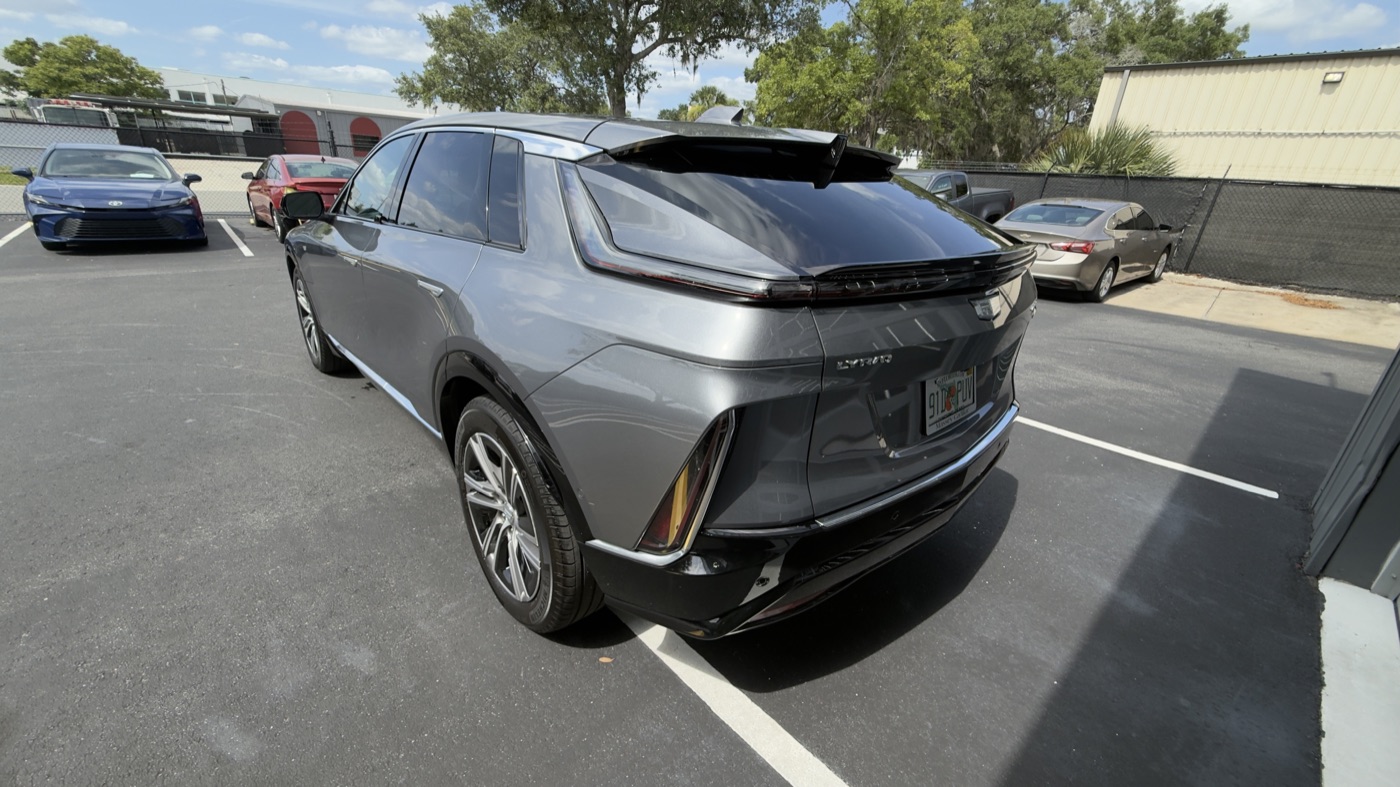 Gray Cadillac Lyriq after collision repair to OEM specifications at Collision Center Orlando