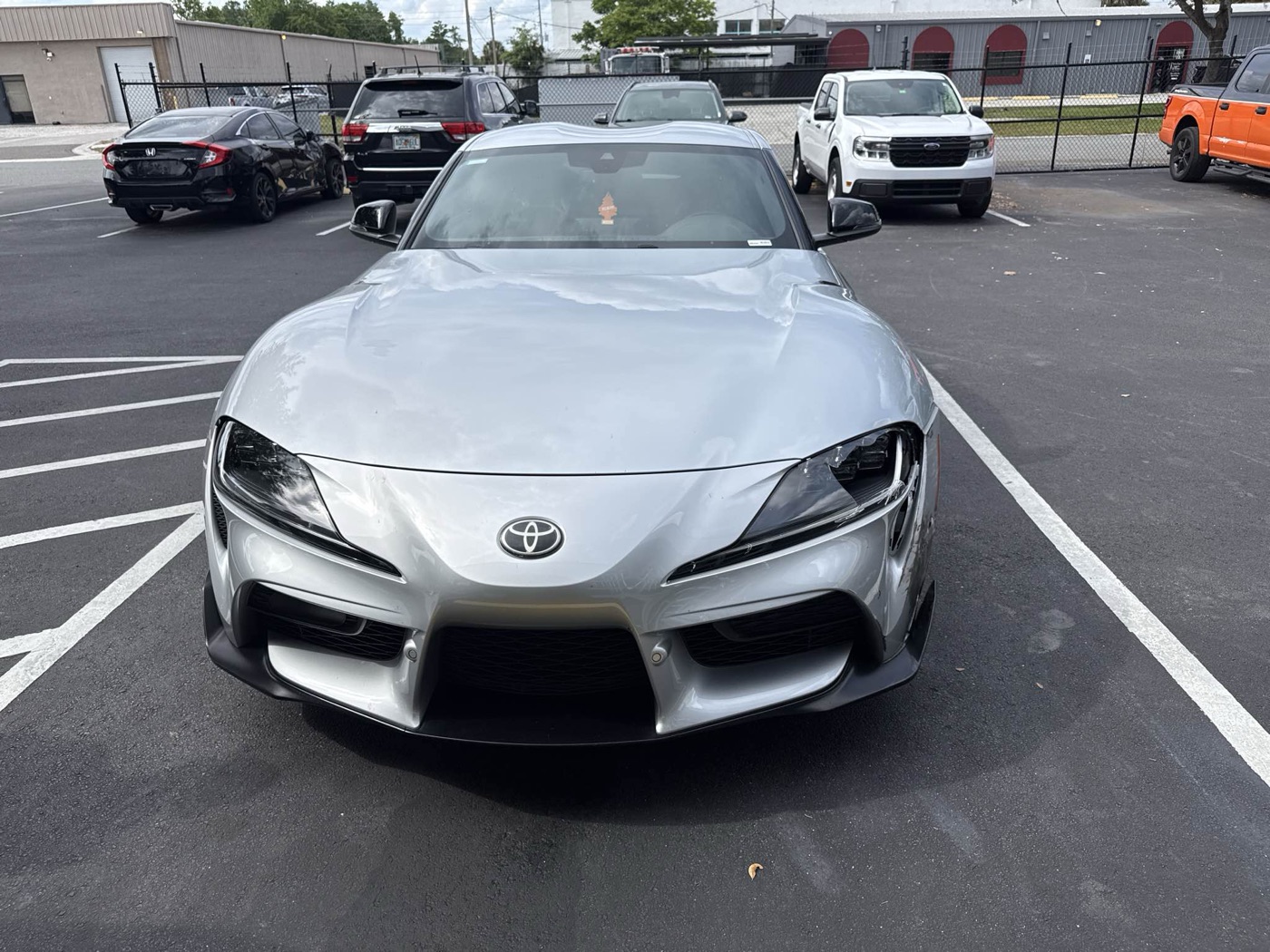 Silver Toyota Supra finished and ready for pickup after collision repair at Collision Center Orlando